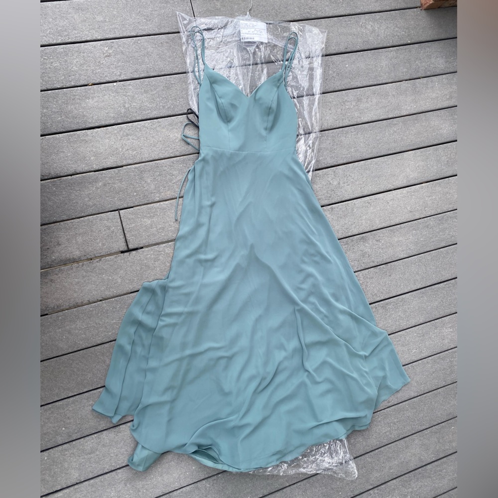 NEW, only worn for fitting and then decided it would be too expensive to alter